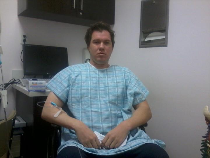 Bjorn in hospital gown during treatment